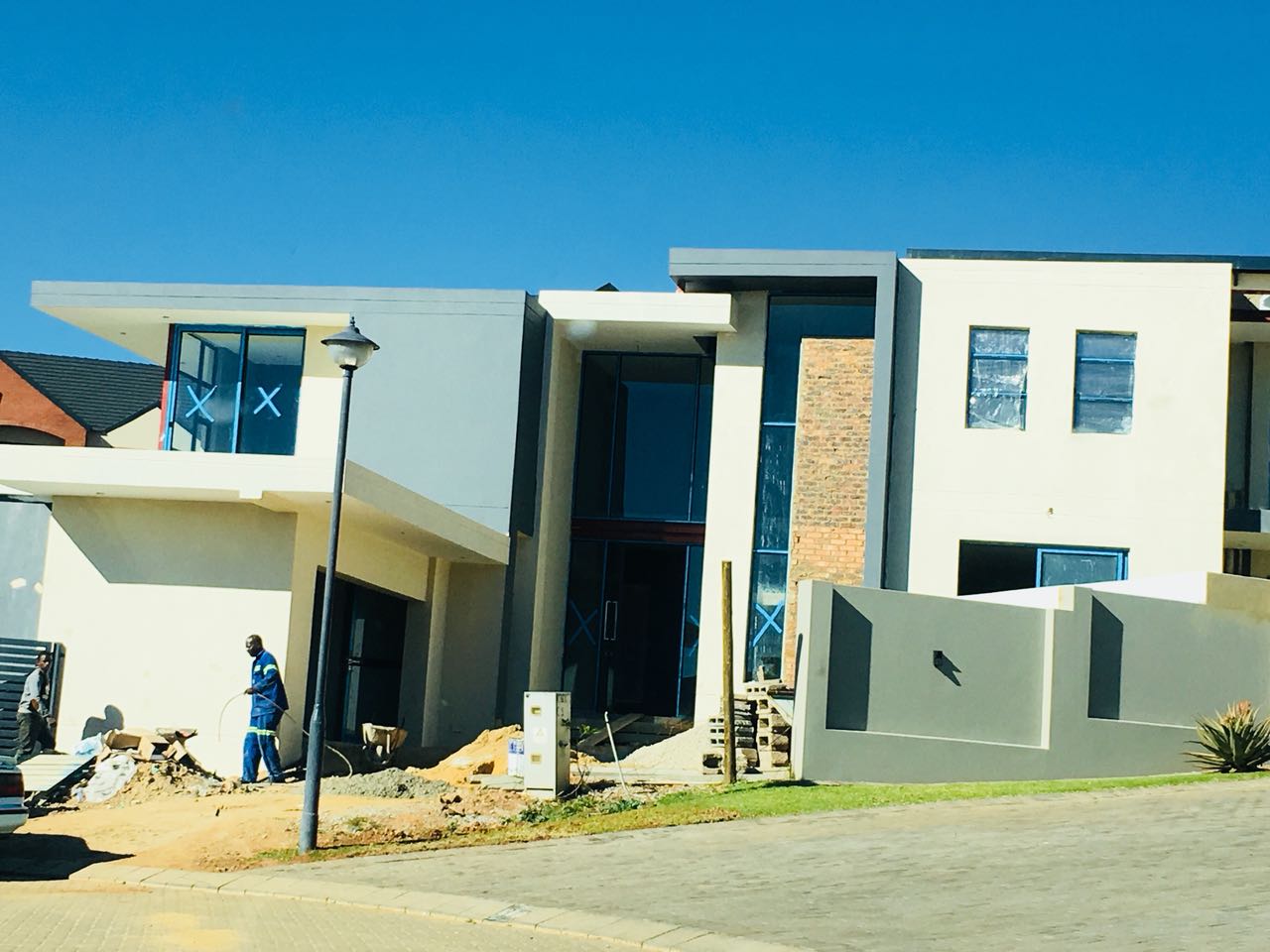 Completed residential build with landscaping